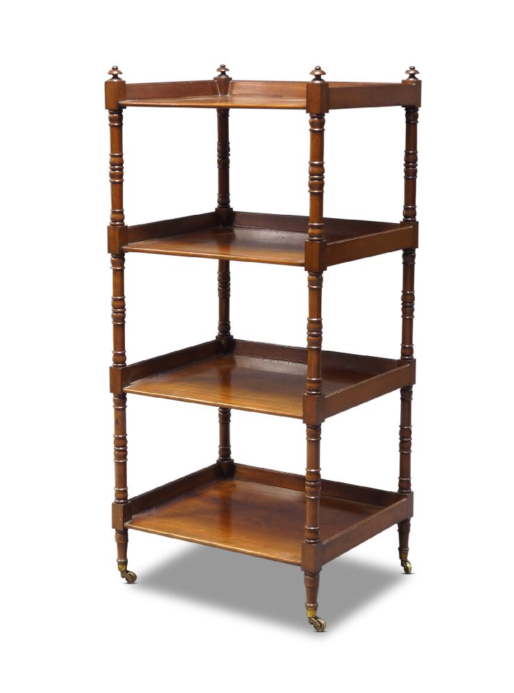 A George IV mahogany four-tier whatnot, with four rectangular tiers on turned supports to brass caps