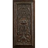 A carved oak Gothic relief panel, late 15th/early 16th century, with tracery decoration, in a modern