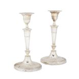 A pair of Victorian neo-classical silver candlesticks, London c.1893, William Hutton & Sons (