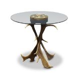 A glass and antler circular table by Anthony Redmile, mid/late 20th century, the top with circular