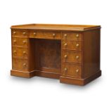 A Scottish Victorian walnut and burr walnut kneehole desk by Morison & Co. Edinburgh, the