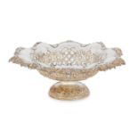 A Victorian pierced silver bowl, c.1840s, the lobed rim with moulded scroll border, embossed pierced