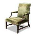 A George III mahogany Gainsborough armchair, the square back above downward swept arms with