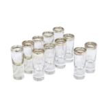 A harlequin set of eleven German silver topped shot glasses, 800 fineness, various makers,10.5cm -