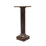 A mahogany pedestal, first half 20th century, the square shelf with boxwood and ebony banding, on