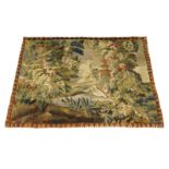 An Aubusson verdure tapestry fragment, 18th Century, depicting a landscape with a bird and pagoda,
