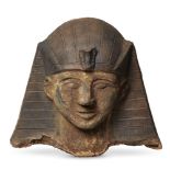 A Continental fragmentary terracotta head of a pharaoh, in the Egyptian taste, 20th century, the