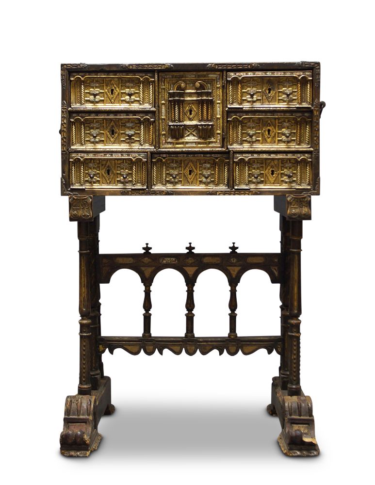 A Spanish walnut vargueno on stand, 17th century, with cast iron handles and strapwork, the front