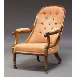 An early Victorian rosewood buttonback nursing chair, with rounded and curved back, upholstered in