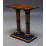 A mahogany and ebonised pedestal, late 20th Century, the rectangular top on twin column supports