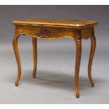 A French walnut card table, early 20th Century, the serpentine fold over top enclosing green baize