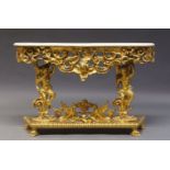 A gilt console table, in the Italian taste, late 20th century, the shaped onyx top, above pierced