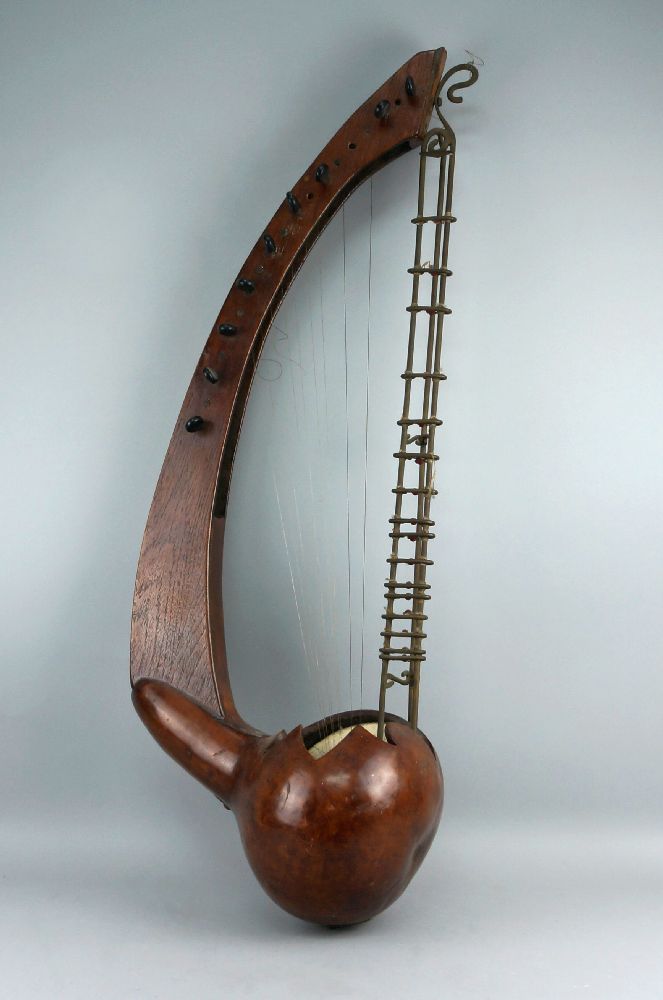 An lyre form stringed instrument, possibly of African origin, 20th century, with a gourd form - Image 2 of 2