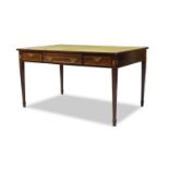 An Edwardian mahogany and boxwood strung desk, the rectangular top inset with green felt writing