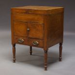 A George IV mahogany and parquetry banded washstand, with alterations, the twin flap top enclosing