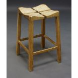 A modern Arts and Crafts oak high stool, c.1970, stamped 'Aldestrop' to underside, the square four-