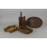 A pair of hinged butter moulds, late 19th/early 20th century, the bases with flower sprays, 28cm