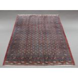 A Bokhara carpet, mid-20th century, the central rectangular reserve set with ten rows of nineteen