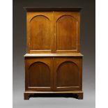 An Anglo Indian teak linen press, second half 19th Century, the moulded