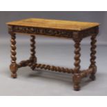 An Edwardian carved oak side table, the rectangular top above frieze with carved scrolling foliate