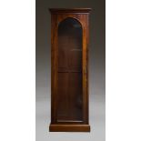 A Victorian mahogany bookcase cabinet, converted from a larger bookcase, the moulded cornice above