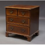A mahogany and satinwood banded chest of drawers, late 19th, early 20th Century, with two long