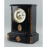 A large black slate and pink marble mantle clock, late 19th century, the white enamel dial with