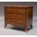 A Regency mahogany chest of drawers, the rectangular top above brushing slide and three long