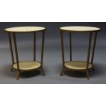 Julian Chichester, a pair of 'Felix' two tier side tables, of recent manufacture, the circular