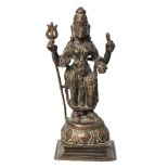 A Kashmiri bronze model of the goddess Durga, 19th century, modelled holding a trident, with