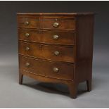 An early Victorian bow front chest, with two short over three long graduated drawers, on bracket