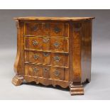 A Dutch walnut commode, 19th Century, the shaped top above four long serpentine drawers, above