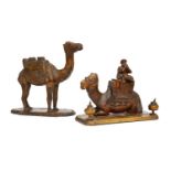 An olivewood souvenir encrier, late 19th/early 20th century, carved in the form of a camel, on a