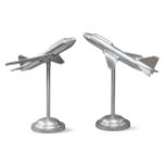 A pair of large polished chrome models of fighter jets, mid/late 20th century, mounted on long