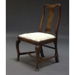 A George II walnut side chair, with curved back and vase shaped splat, above drop in seat on front