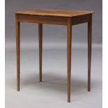 An Edwardian mahogany and inlaid side table, the rectangular top with inlaid patera, raised on