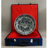 A Chinese porcelain blue and white dish, in the Ming Style, of recent manufacture, decorated with