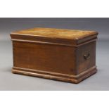 A Victorian mahogany chest, the hinged rectangular lid, enclosing candle box and storage space,