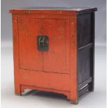 A Chinese red lacquered and parcel gilt side cabinet, 20th Century, with two cupboard doors