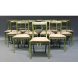 A set of twelve Regency style green painted and parcel gilt dining chairs, late 20th Century, the