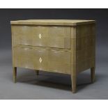 A modern shagreen chest of drawers, of recent manufacture, the rectangular top above two drawers, on