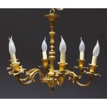 A gilt-bronze 6-light chandelier, early 20th century, in the French taste with a central facetted