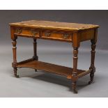 A late Victorian mahogany two tier side table, the rectangular top, with later applied vinyl