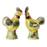 A pair of Chinese sancai biscuit porcelain chickens, mid-19th century, 11.5cm highOne has two