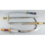 A group of four fantasy display swords, of modern manufacture, to comprise a scimitar type sword