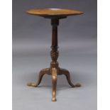 A George III style mahogany tilt top occasional table, late 19th Century, the circular top above