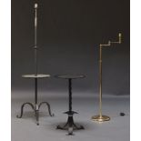 A polished brass standard lamp, c.1980, the adjustable stem, with extending horizontal arm, on