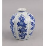 A Chinese blue and white vase, of recent manufacture, of oval form with moulded ridges, decorated