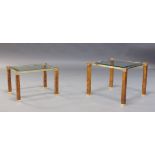 Pierre Vandel, two brass and burr wood effect side tables, c.1980, of square form, each with clear