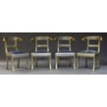 A set of four Anglo Indian white metal clad chairs, the curved top rails flanked by gilt rams heads,